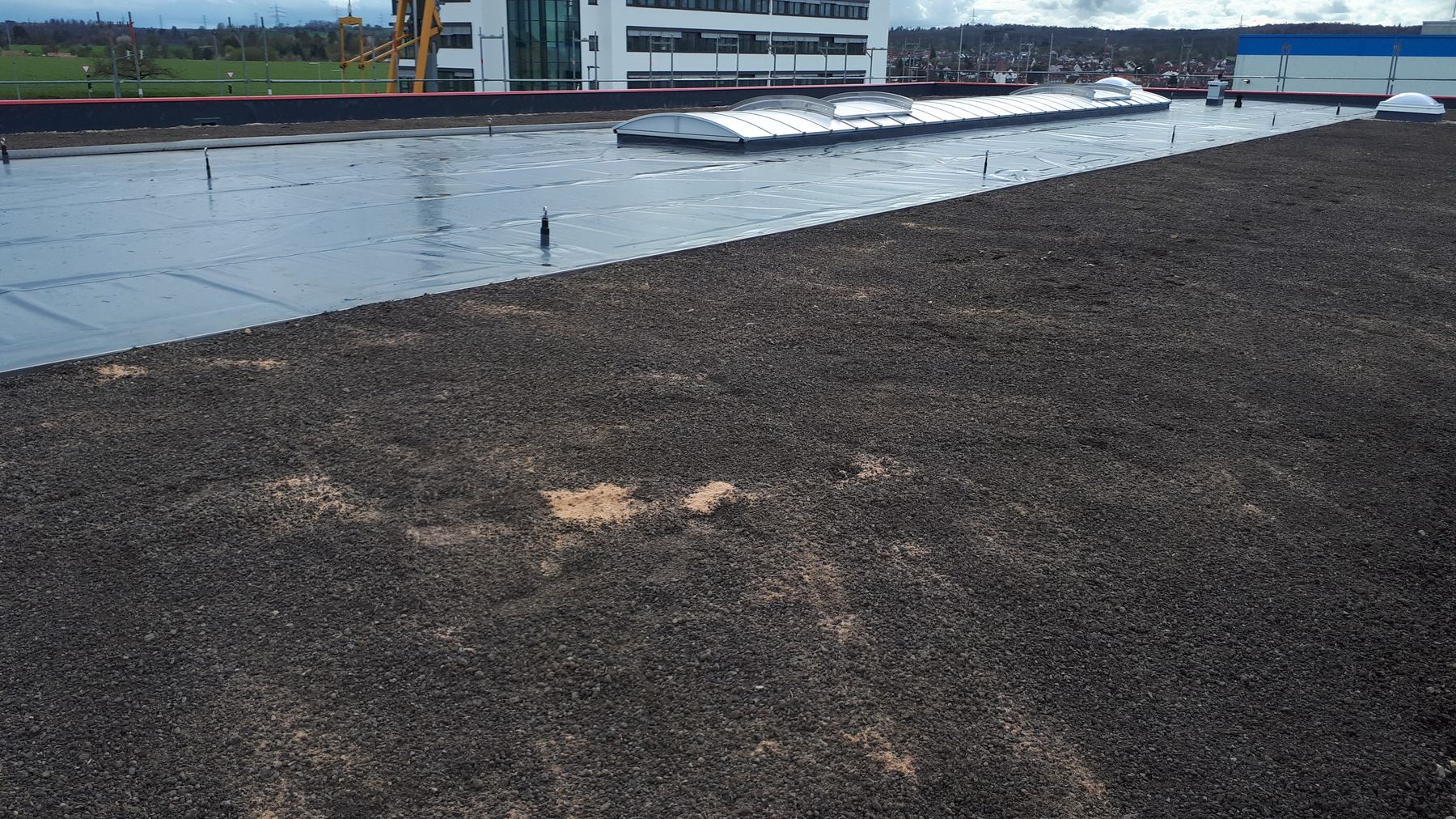 Neubau-Flachdach in Böblingen mit Alwitra-Folie Bild 17